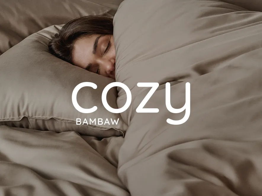 Cozy logo over bamboo bedding