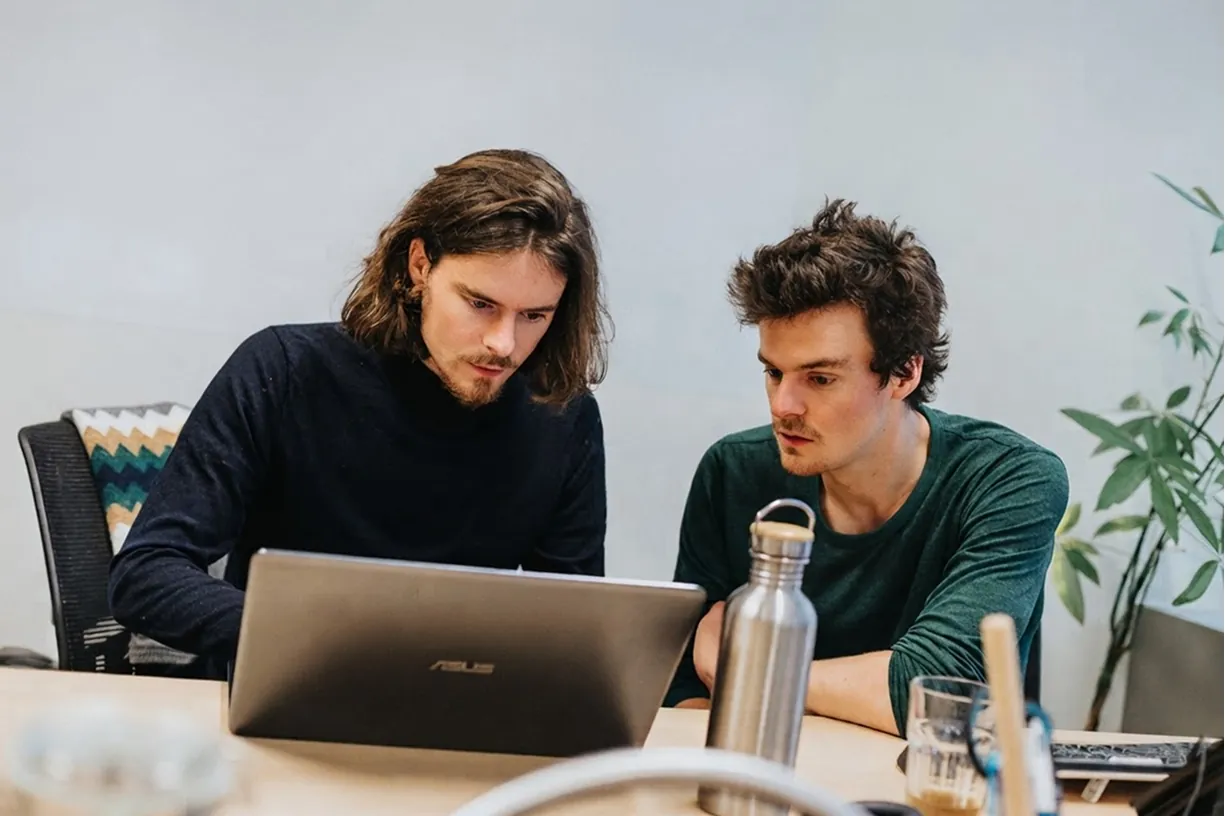 Max and Gus working in the office
